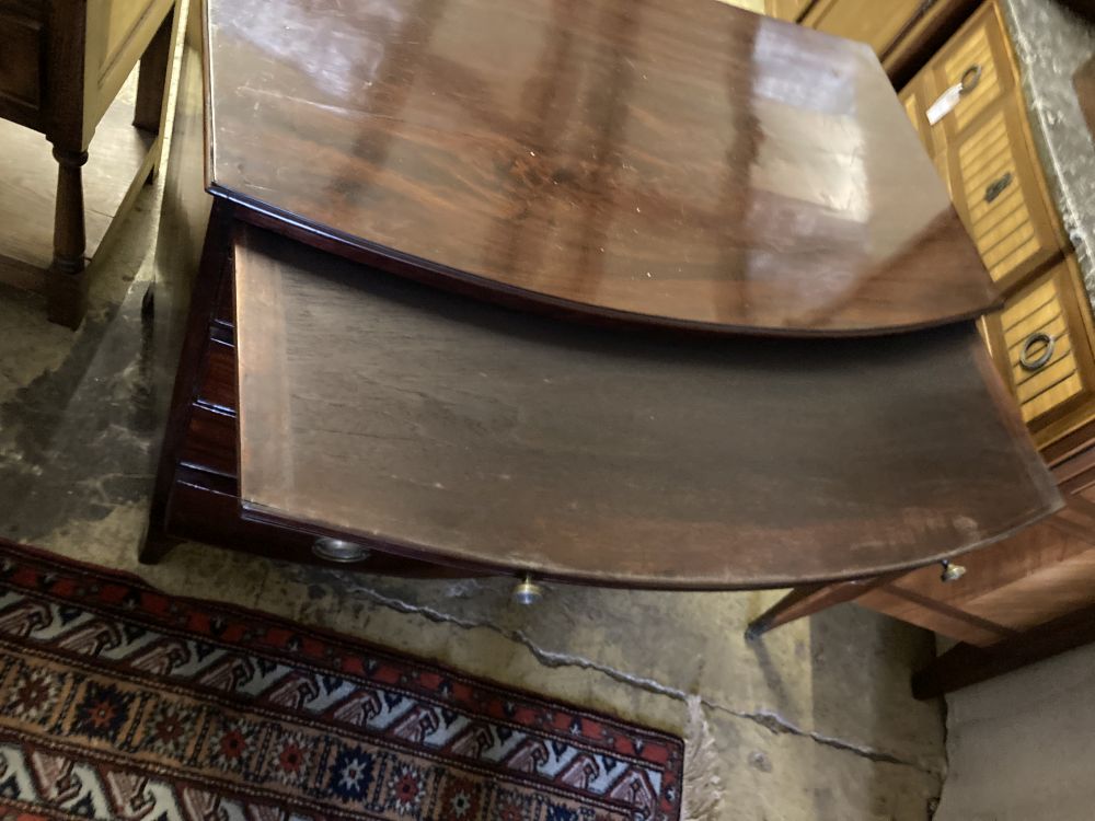 A Regency mahogany bowfront chest with brushing slide, width 100cm depth 58cm, height 86cm